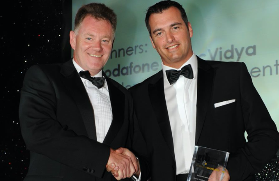 Alex Nelles receiving the Global Telecoms Business Innovation Award in 2010 in London for his innovative approach to managing dealers in the Vodafone Germany Retail Chain, recognized for his commitment to fostering new ideas and business transformation.